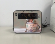 Radio réveil Bébé dans une tasse de thé